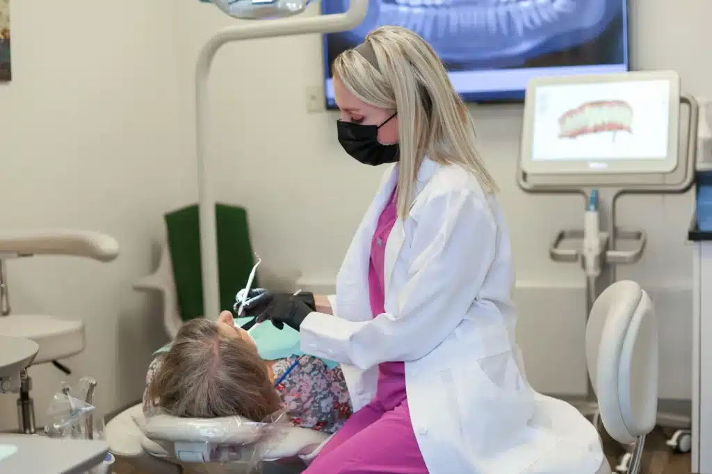 Amarillo dental implant specialist treating a patient.